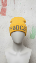 Stencil yellow beanie with logo patch