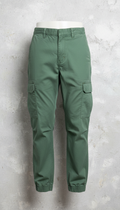 Spray green cargo pants with street dye